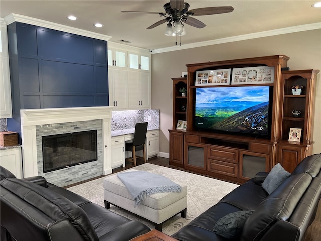 5603 S Archbridge Ct, Arlington, TX 76017 - living room with ornamental molding, ceiling fan, a glass covered fireplace, and recessed lighting