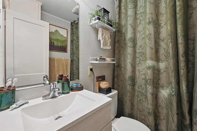 4808 Birchman Ave, Fort Worth, TX 76107 - bathroom with a textured wall, toilet, vanity, and a shower with curtain