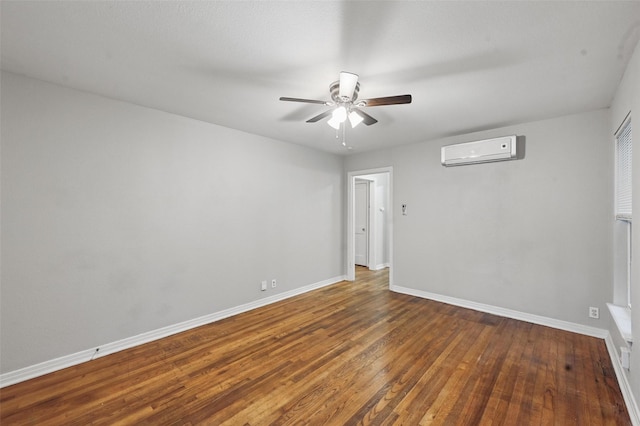 4808 Birchman Ave, Fort Worth, TX 76107 - unfurnished room featuring a wall mounted AC, hardwood / wood-style flooring, baseboards, and a ceiling fan