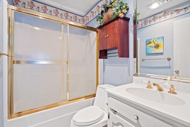 219 Ray Rd, Pottsboro, TX 75076 - full bath with wallpapered walls, vanity, shower / bath combination with glass door, and toilet