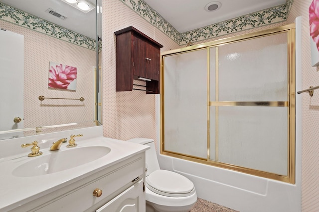 219 Ray Rd, Pottsboro, TX 75076 - full bathroom featuring wallpapered walls, shower / bath combination with glass door, toilet, and vanity