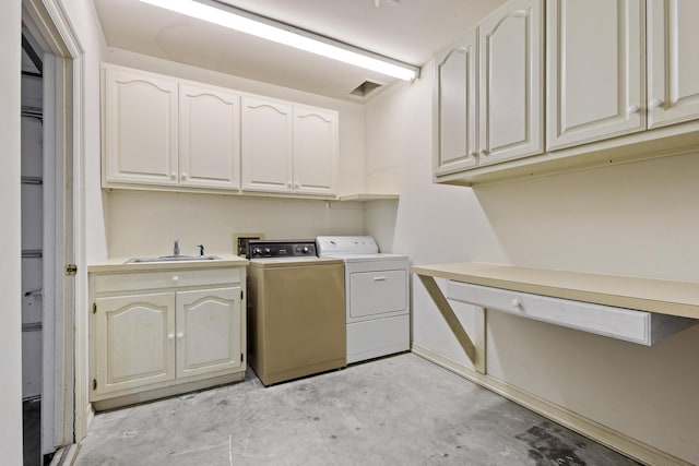 219 Ray Rd, Pottsboro, TX 75076 - clothes washing area featuring washer and dryer and cabinet space