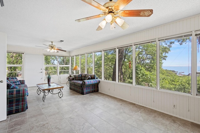 219 Ray Rd, Pottsboro, TX 75076 - sunroom featuring a ceiling fan and an outdoor living space