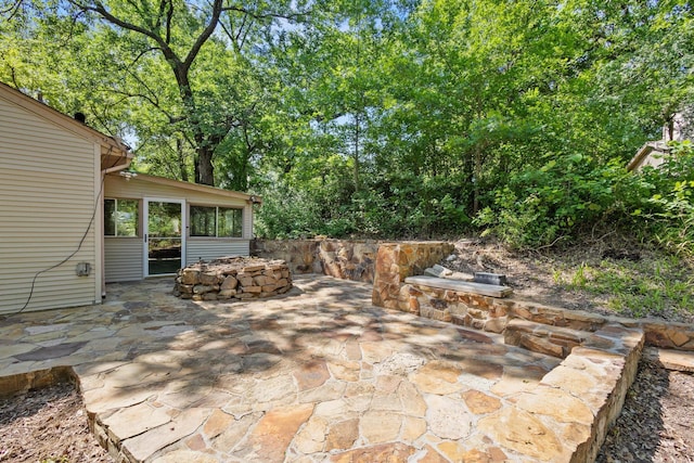 219 Ray Rd, Pottsboro, TX 75076 - view of patio / terrace with an outdoor fire pit