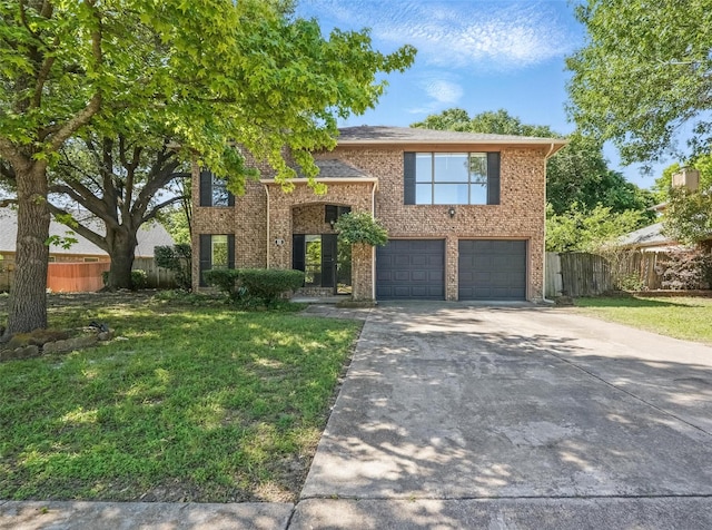 521 Bent Creek Dr, Garland, TX 75040 - view of front of home with concrete driveway, an attached garage, and brick siding