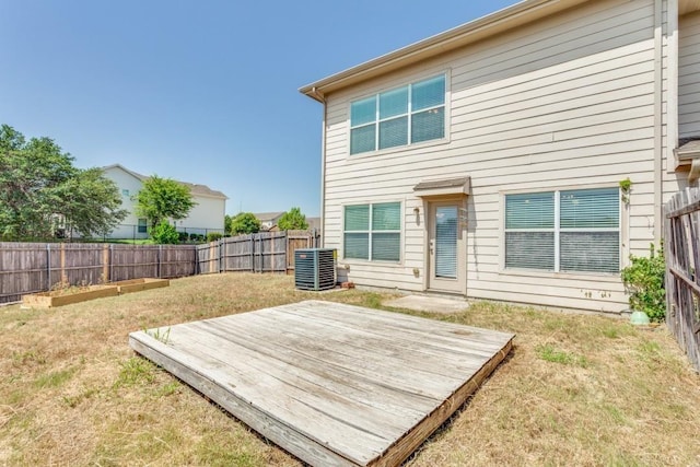 7500 Lazy Spur Blvd, Fort Worth, TX 76131 - rear view of house featuring a wooden deck and central AC unit