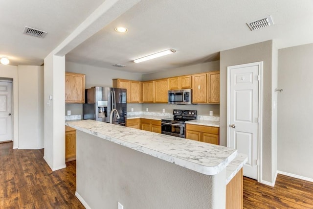 7500 Lazy Spur Blvd, Fort Worth, TX 76131 - kitchen with stainless steel appliances, light countertops, dark wood-type flooring, baseboards, and recessed lighting
