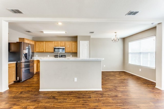 7500 Lazy Spur Blvd, Fort Worth, TX 76131 - kitchen with stainless steel appliances, a chandelier, light countertops, and dark wood finished floors