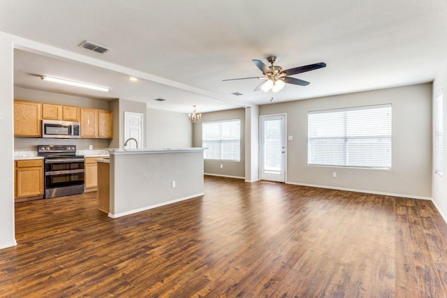 7500 Lazy Spur Blvd, Fort Worth, TX 76131 - kitchen featuring appliances with stainless steel finishes, light countertops, ceiling fan, and baseboards