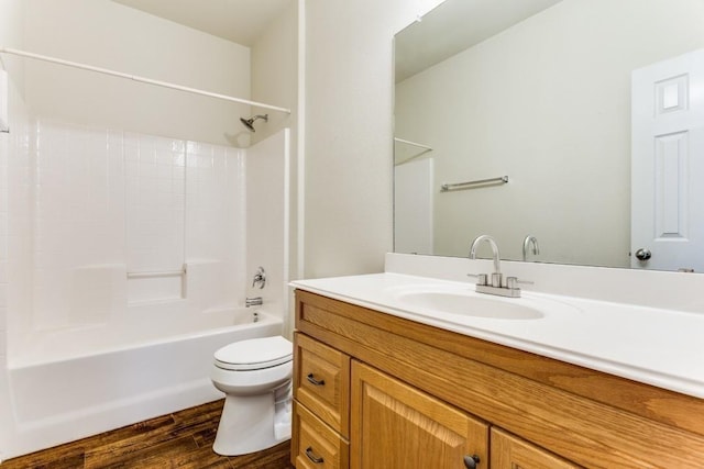7500 Lazy Spur Blvd, Fort Worth, TX 76131 - full bathroom featuring toilet, wood finished floors, vanity, and bathing tub / shower combination