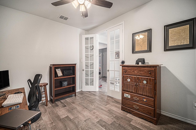 6505 Boot Jack Dr, Burleson, TX 76058 - office area featuring french doors, wood finished floors, ceiling fan, and baseboards