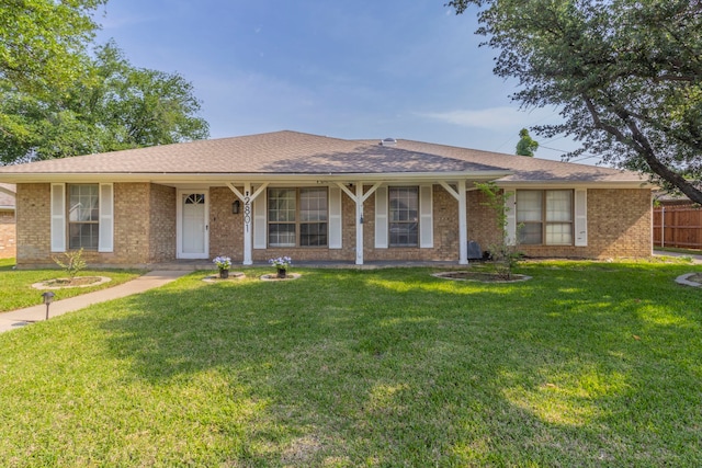 2801 Peachtree Ln, Pantego, TX 76013 - single story home featuring brick siding, covered porch, and a shingled roof