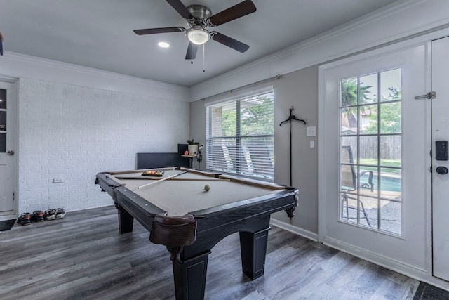 2801 Peachtree Ln, Pantego, TX 76013 - playroom with brick wall, billiards, ornamental molding, wood finished floors, and ceiling fan