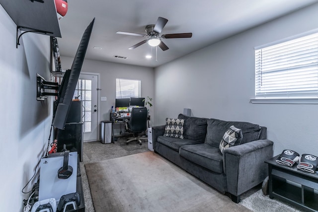 2801 Peachtree Ln, Pantego, TX 76013 - carpeted living room with a desk and a ceiling fan