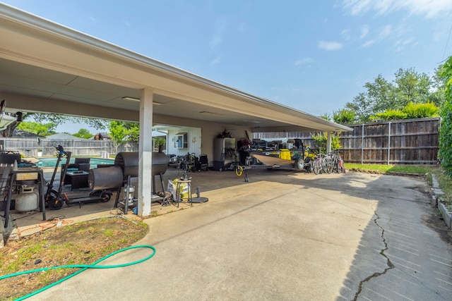 2801 Peachtree Ln, Pantego, TX 76013 - view of patio / terrace featuring a fenced backyard and driveway