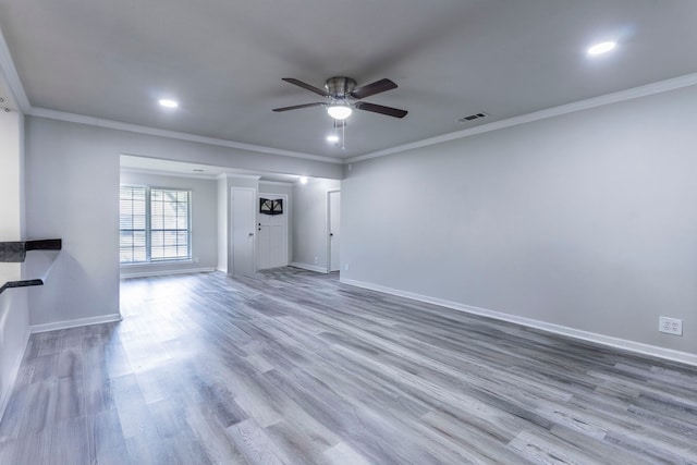 2801 Peachtree Ln, Pantego, TX 76013 - unfurnished living room featuring ceiling fan, baseboards, wood finished floors, crown molding, and recessed lighting