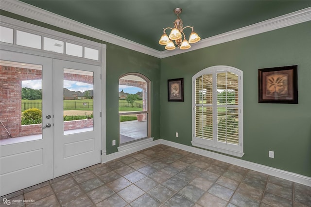 532 Hunters Run, Bossier City, LA 71111 - foyer featuring a chandelier, french doors, stone finish floors, baseboards, and crown molding