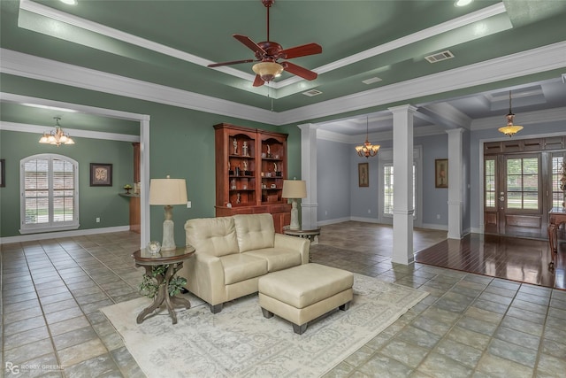 532 Hunters Run, Bossier City, LA 71111 - living area with decorative columns, stone tile flooring, baseboards, ceiling fan, and ornamental molding