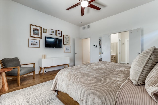 5006 Mission Ave, Dallas, TX 75206 - bedroom with wood finished floors, baseboards, and ceiling fan