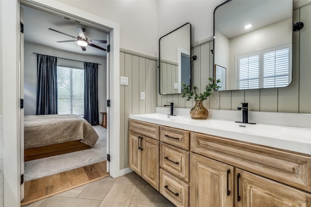5006 Mission Ave, Dallas, TX 75206 - ensuite bathroom with ceiling fan, double vanity, and tile patterned flooring