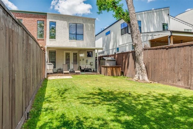 5006 Mission Ave, Dallas, TX 75206 - back of house with brick siding and a patio area