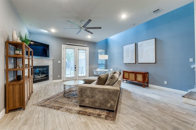5006 Mission Ave, Dallas, TX 75206 - living area with ceiling fan, a fireplace, baseboards, light wood-type flooring, and recessed lighting