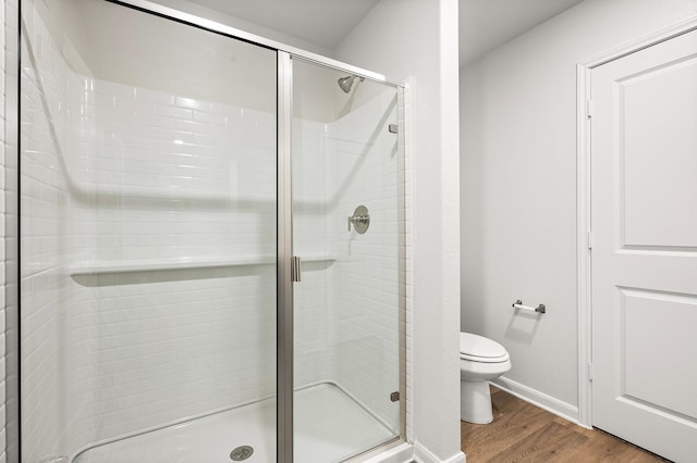 432 Gib Woodall Dr, Venus, TX 76084 - full bath featuring wood finished floors, toilet, a stall shower, and baseboards