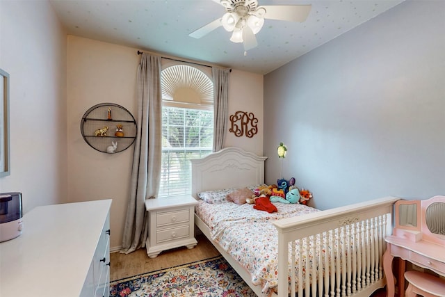 203 Millington Trl, Mansfield, TX 76063 - bedroom with light wood-style flooring, baseboards, and a ceiling fan