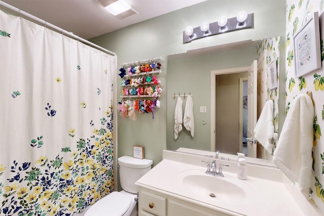 203 Millington Trl, Mansfield, TX 76063 - bathroom with toilet, vanity, and curtained shower