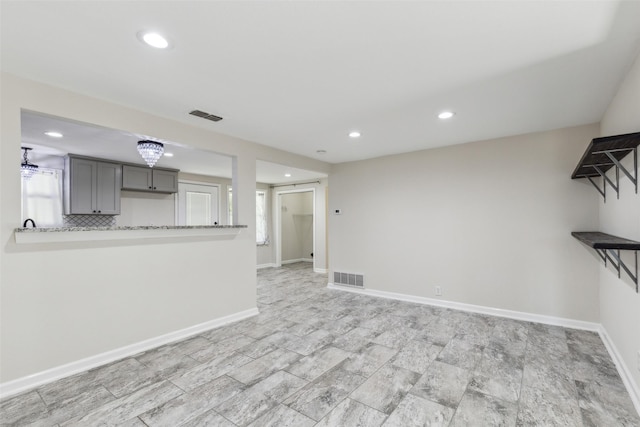 7613 Hewitt St, North Richland Hills, TX 76182 - unfurnished living room featuring recessed lighting and baseboards