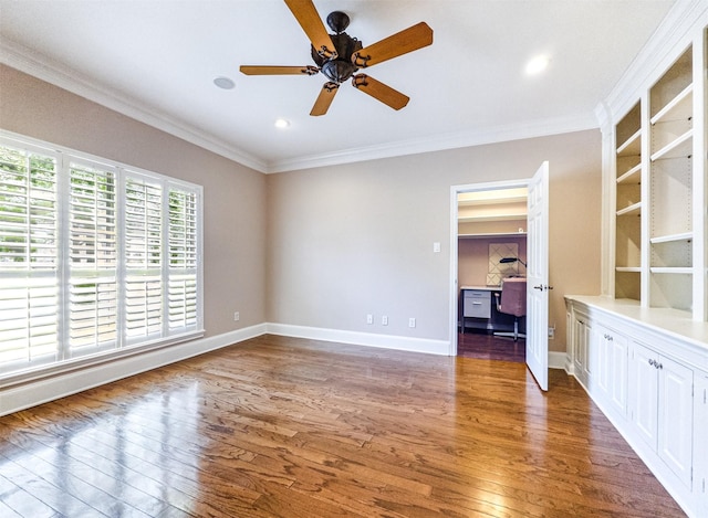 2215 Firestone Cir, Tyler, TX 75703 - spare room featuring ornamental molding, wood finished floors, ceiling fan, an office area, and baseboards