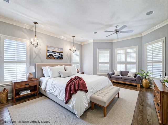 2215 Firestone Cir, Tyler, TX 75703 - bedroom featuring a chandelier, hardwood / wood-style floors, and ornamental molding