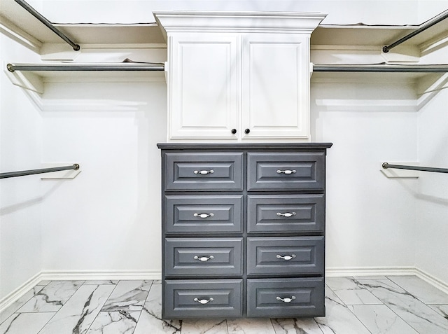2215 Firestone Cir, Tyler, TX 75703 - spacious closet featuring light marble finish floors