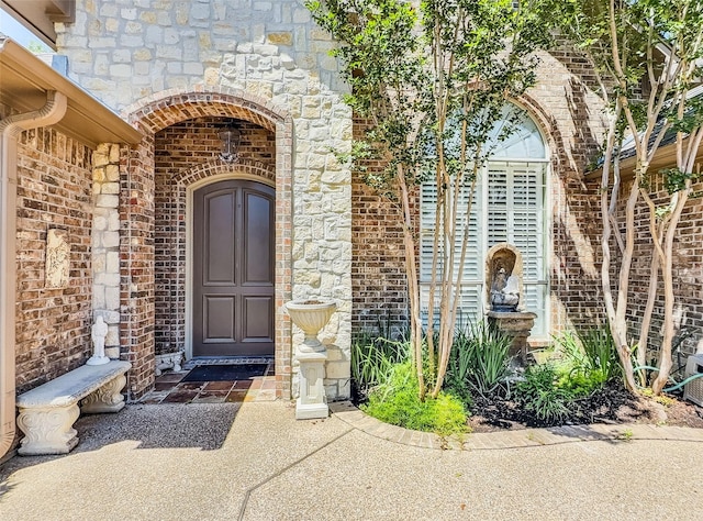 2215 Firestone Cir, Tyler, TX 75703 - entrance to property with brick siding and stone siding