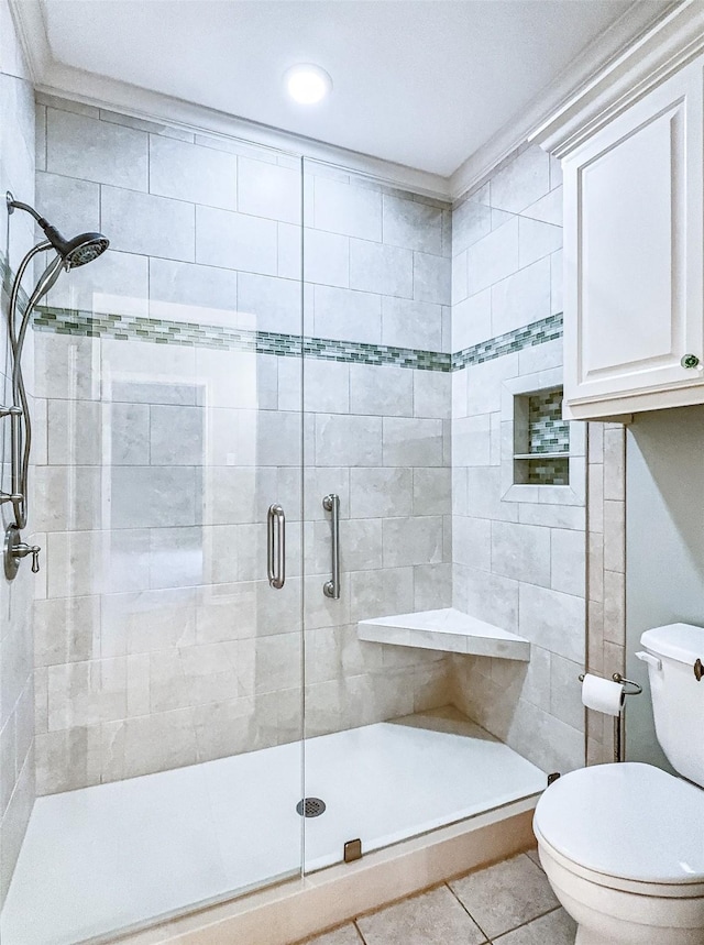 2215 Firestone Cir, Tyler, TX 75703 - full bath featuring toilet, a shower stall, and tile patterned flooring