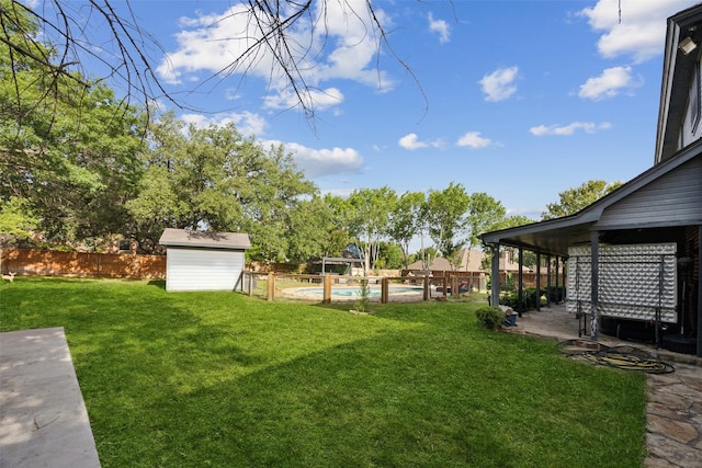 605 Keel Way, Azle, TX 76020 - view of yard featuring a storage shed, a patio area, and an outbuilding