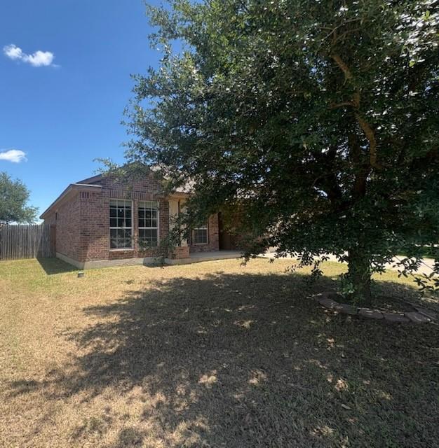 10237 Marigold Rd, Waco, TX 76708 - rear view of property with brick siding