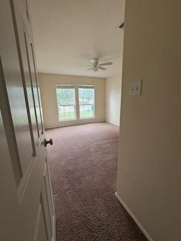 10237 Marigold Rd, Waco, TX 76708 - carpeted empty room with ceiling fan
