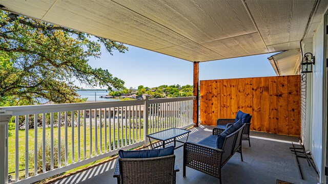 4536 Overlook Ct, Granbury, TX 76049 - balcony with a water view and an outdoor living space