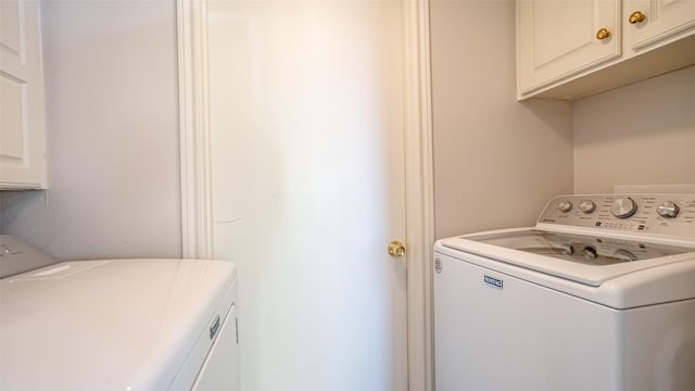 4536 Overlook Ct, Granbury, TX 76049 - laundry room with washing machine and dryer and cabinet space