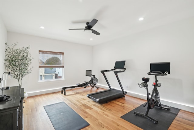 workout room with a ceiling fan, wood finished floors, baseboards, and recessed lighting