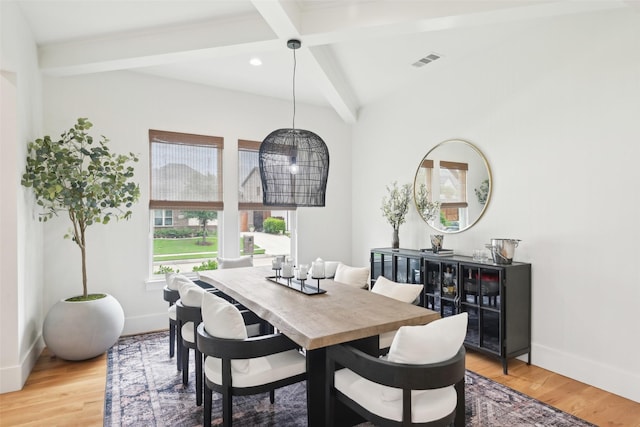 dining space featuring beamed ceiling, baseboards, light wood-style flooring, and recessed lighting