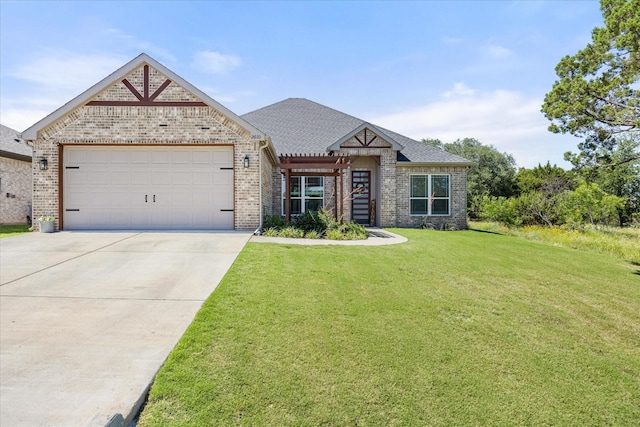 2610 Austin Dr, Granbury, TX 76048 - view of front of house with brick siding, a front lawn, a garage, driveway, and a pergola