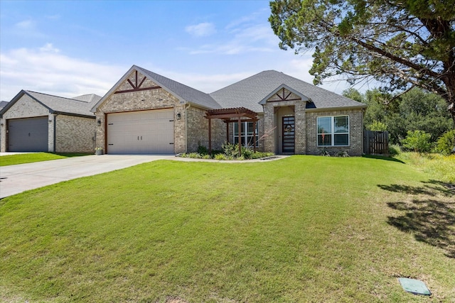 2610 Austin Dr, Granbury, TX 76048 - view of front of property featuring brick siding, driveway, an attached garage, and a front lawn