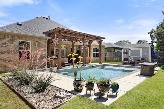2610 Austin Dr, Granbury, TX 76048 - view of pool with a pergola, an outbuilding, a patio, and a shed