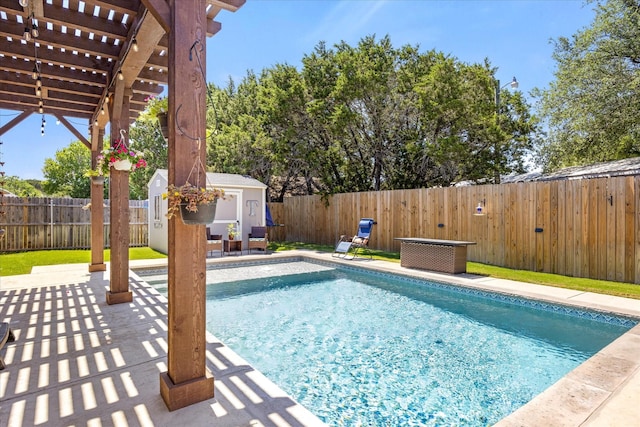 2610 Austin Dr, Granbury, TX 76048 - view of swimming pool with an outdoor structure, a storage unit, a fenced backyard, a patio, and a pergola
