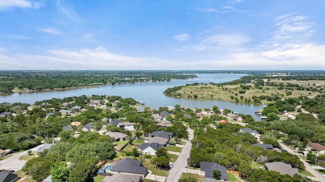 2610 Austin Dr, Granbury, TX 76048 - aerial perspective of suburban area with a large body of water