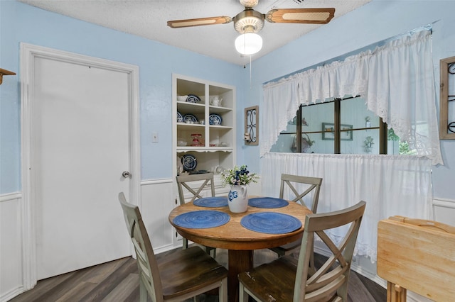 805 Sandpiper Dr, Denton, TX 76205 - dining area with wood finished floors, a ceiling fan, and built in features