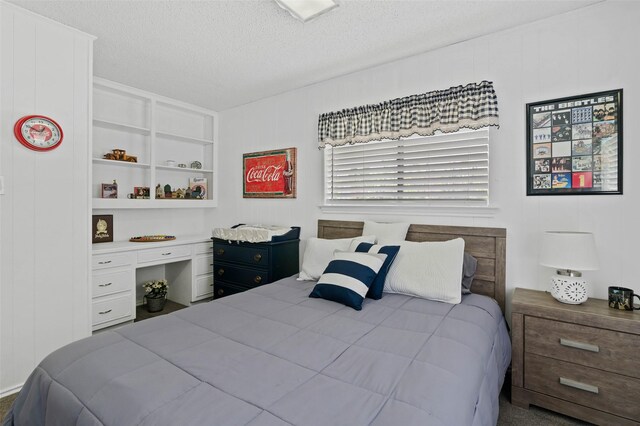 805 Sandpiper Dr, Denton, TX 76205 - bedroom with a textured ceiling
