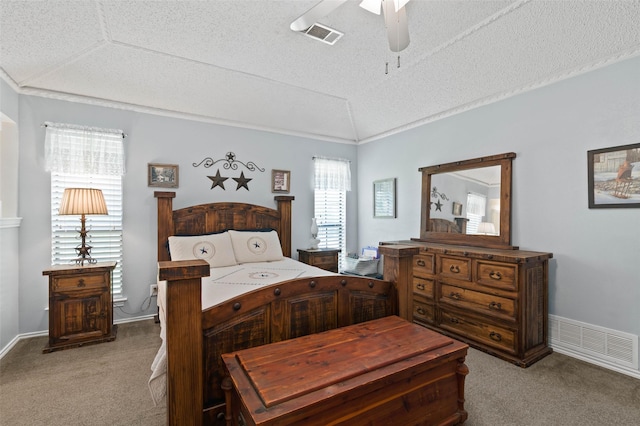 805 Sandpiper Dr, Denton, TX 76205 - carpeted bedroom featuring a textured ceiling, lofted ceiling, ceiling fan, and baseboards